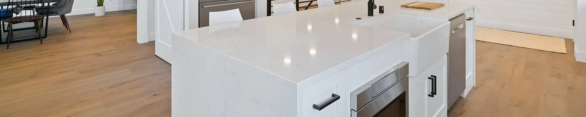 white quartz countertop installed on large kitchen island
